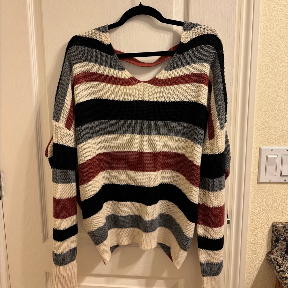 striped sweater with an open back size small